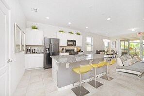 Family Townhome, Kitchen, Garden Area | Private kitchen | Stovetop, dishwasher, cookware/dishes/utensils