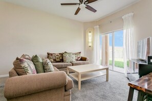 Family Townhome, Garden Area | Living room | Flat-screen TV, video-game console
