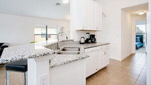 Family Villa, Garden Area | Private kitchen | Stovetop, dishwasher, cookware/dishes/utensils - Ev8092ha - Providence - 4 Bed 4 Baths Villa (Davenport)