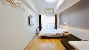 Desk, blackout drapes, soundproofing, iron/ironing board