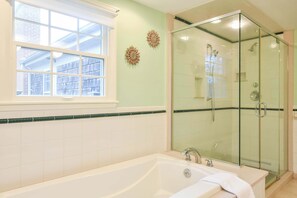 Shower, hair dryer, towels, shampoo