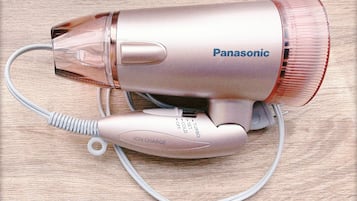 Hair dryer, slippers, towels, shampoo