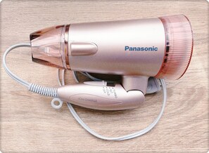 Hair dryer, slippers, towels, shampoo