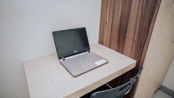 Laptop workspace, free WiFi, bed sheets
