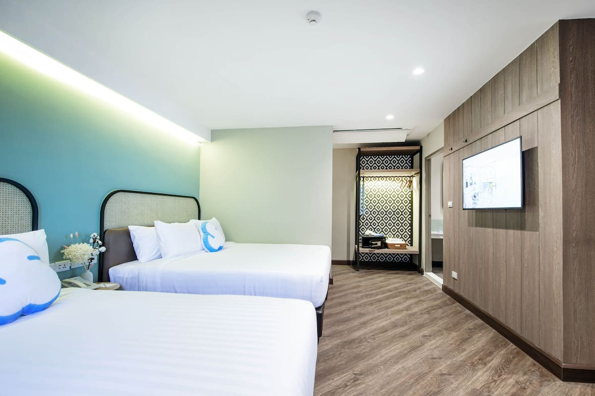 Quadruple Room | Premium bedding, in-room safe, desk, blackout curtains