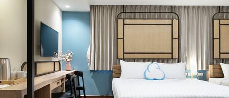Luxe beddengoed, een kluis op de kamer, een bureau