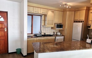 Familienapartment | Eigene Kochnische | Kühlschrank, Mikrowelle, Herdplatte, Geschirrspüler