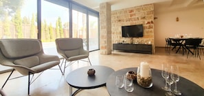 Exclusieve villa | Woonruimte | Een flatscreentelevisie, Netflix en streamingdiensten