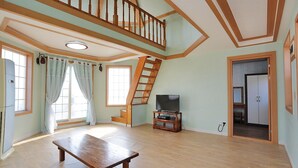 Duplex (Landora) | Living area | TV - Batnaru Caravan (Taean)