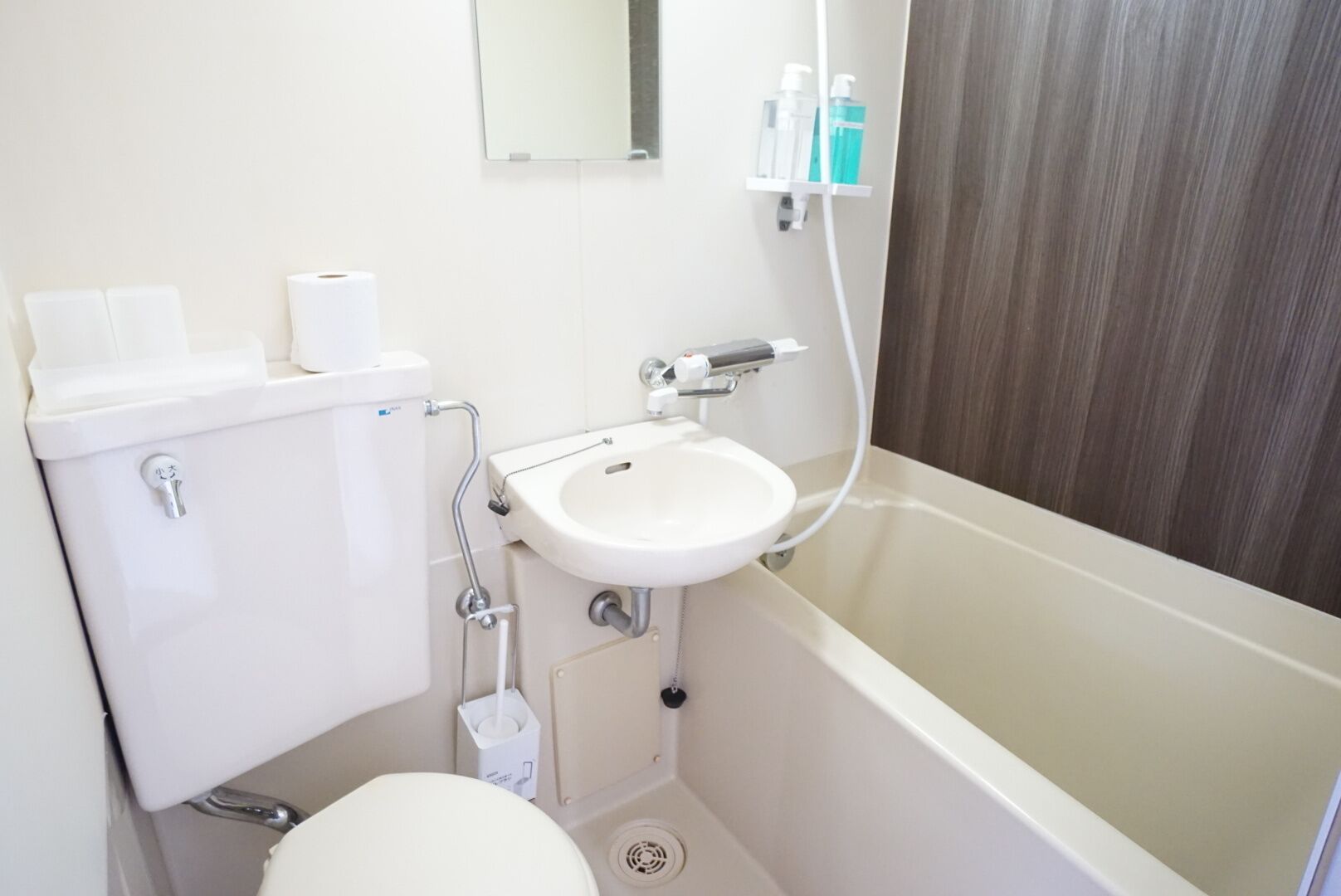 Economy Quadruple Room | Bathroom | Combined shower/tub, free toiletries, hair dryer, slippers