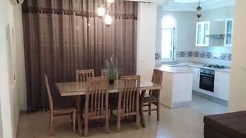 Villa, 2 Bedrooms | Private kitchen | Full-sized fridge, oven, stovetop, cookware/dishes/utensils