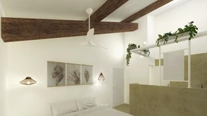 A modern bedroom with a large bed, a small bedside table, a ceiling fan, wall-mounted lighting, and a green accent wall. - L'Ostalas (Lafrancaise)