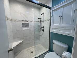 Combined shower/tub