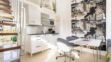 Apartment, Mezzanine | Private kitchen | Fridge, microwave, stovetop, coffee/tea maker