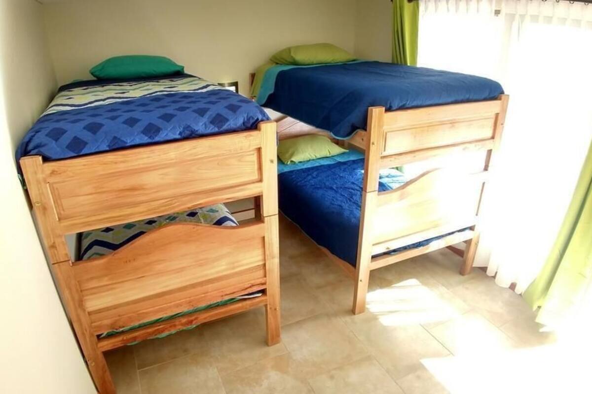 Standard Quadruple Room | Iron/ironing board, bed sheets