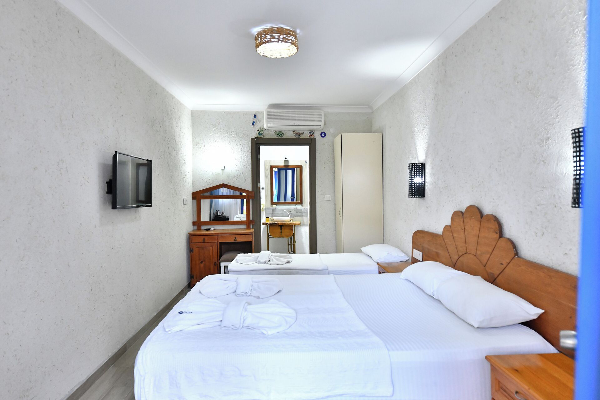 Quarto triplo luxo | Frigobar, cofres nos quartos, Wi-Fi de cortesia, roupa de cama