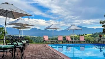 Outdoor pool, pool umbrellas, pool loungers