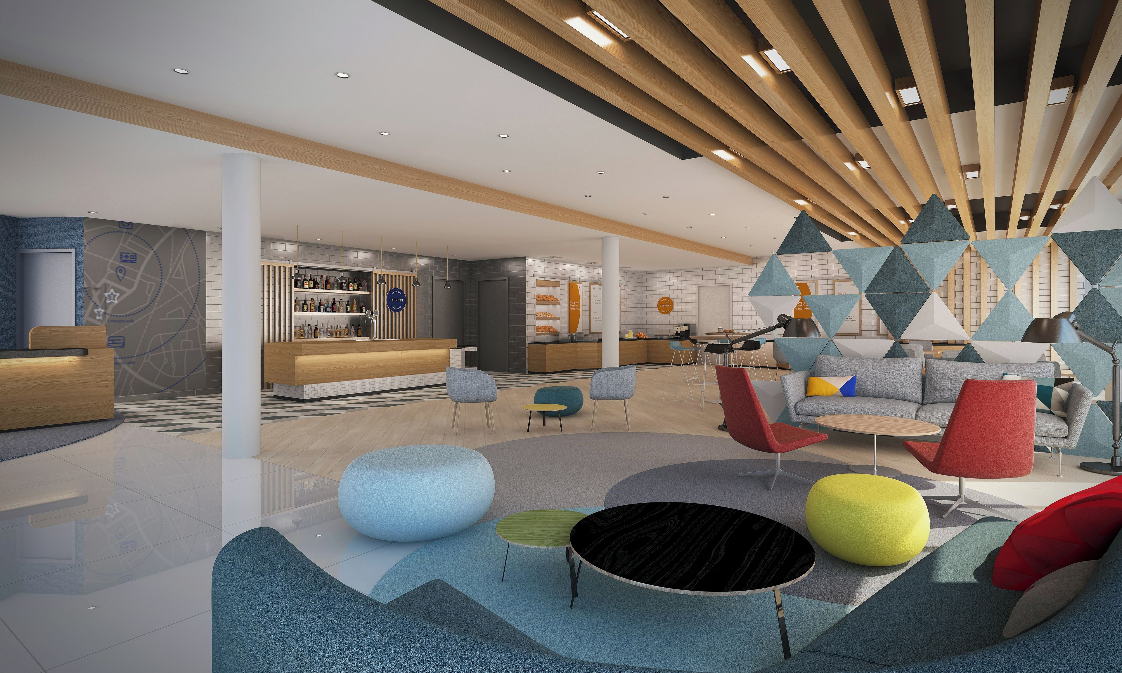 A modern lobby with a reception desk, seating area, and a bar.
