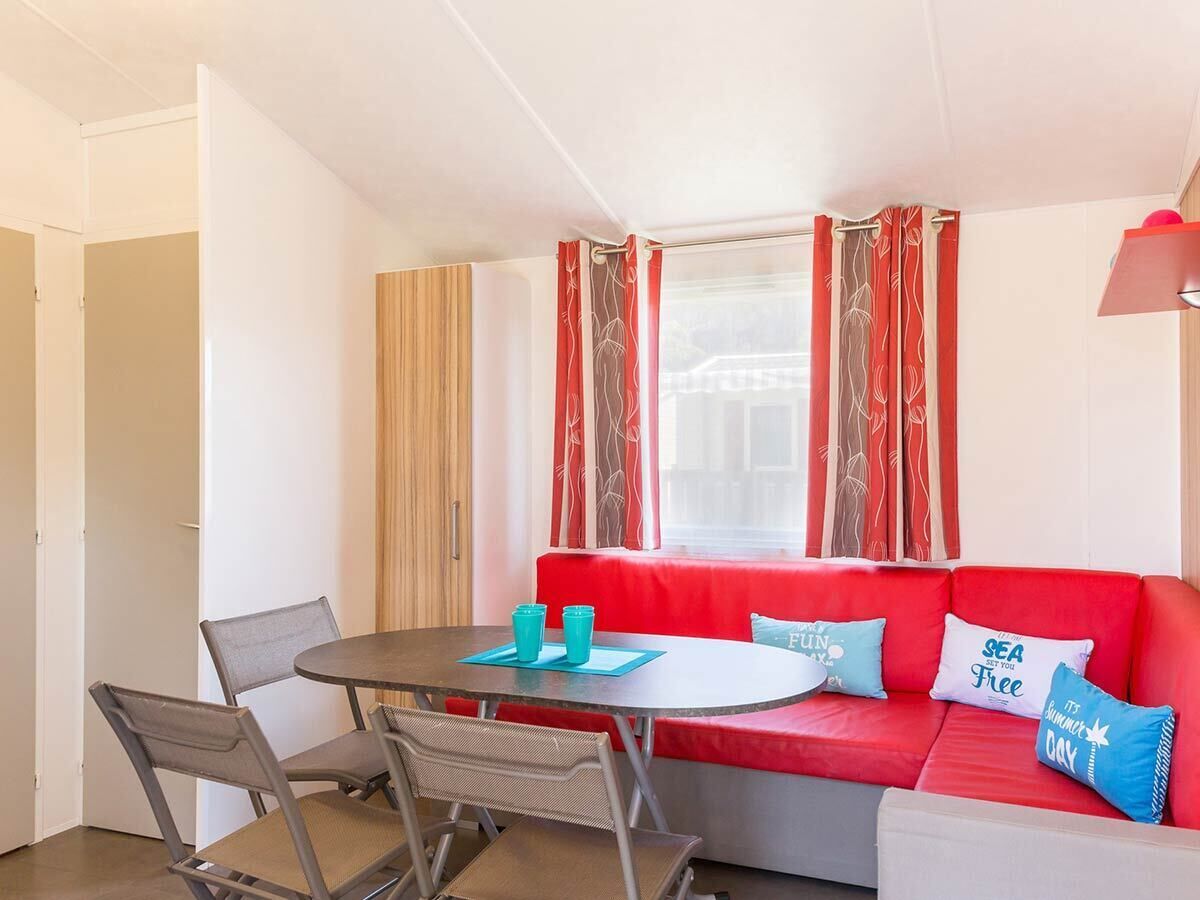 Cottage (Alizé) | Living area | Flat-screen TV