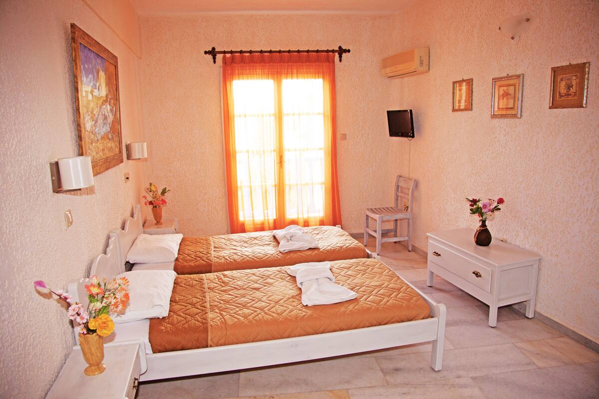 Chambre avec lits jumeaux, vue mer