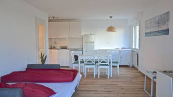 Apartment, 2 Bedrooms | Living area | Flat-screen TV