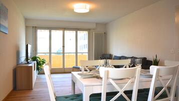 Apartment, 2 Bedrooms | Living area | Flat-screen TV