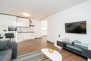 Apartment (One Bedroom Apartment) | Living room | 25-inch flat-screen TV with satellite channels, TV - Apartments Blue Chill (Zupa dubrovacka)