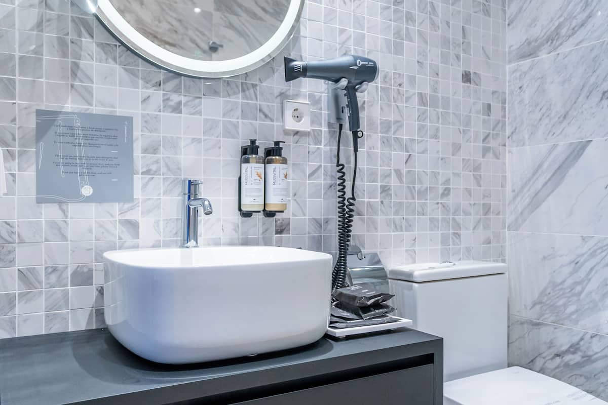 shower, rainfall showerhead, designer toiletries, hair dryer