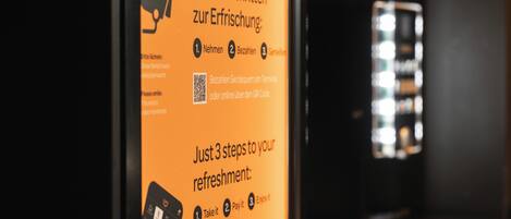 A sign with instructions for a refreshment process, including steps and QR codes.