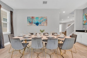 Palatine Dinging Area of the Apartment in Kissimmee Florida - 10 Persons Dining - Artfully arranged table settings for a touch of elegance - Mix of textures, such as velvet dining chairs and a polished table - Pool Home! 5BR w Patio & Free Parking near Disney (Kissimmee)