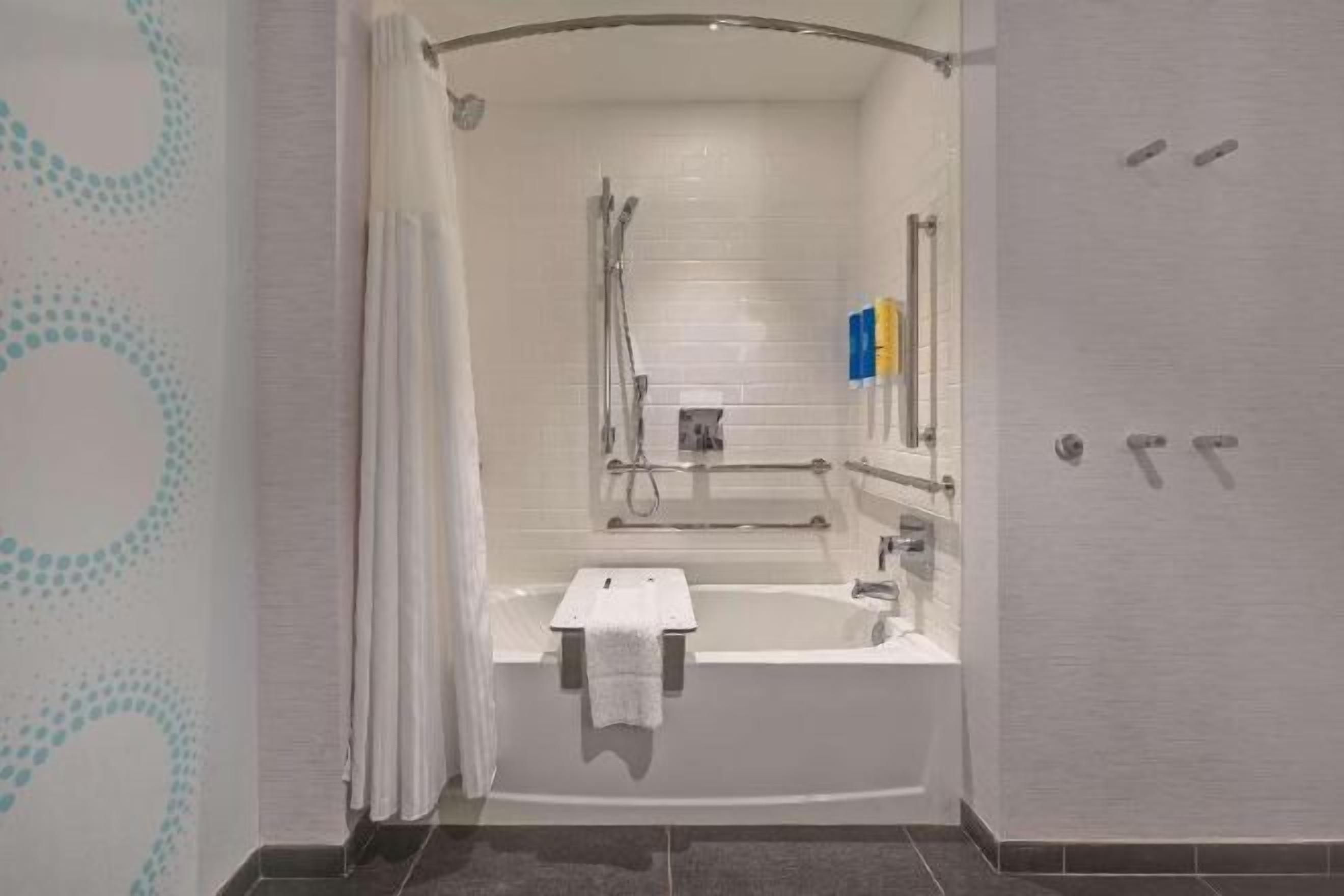 Combined shower/bathtub, hair dryer, towels, soap