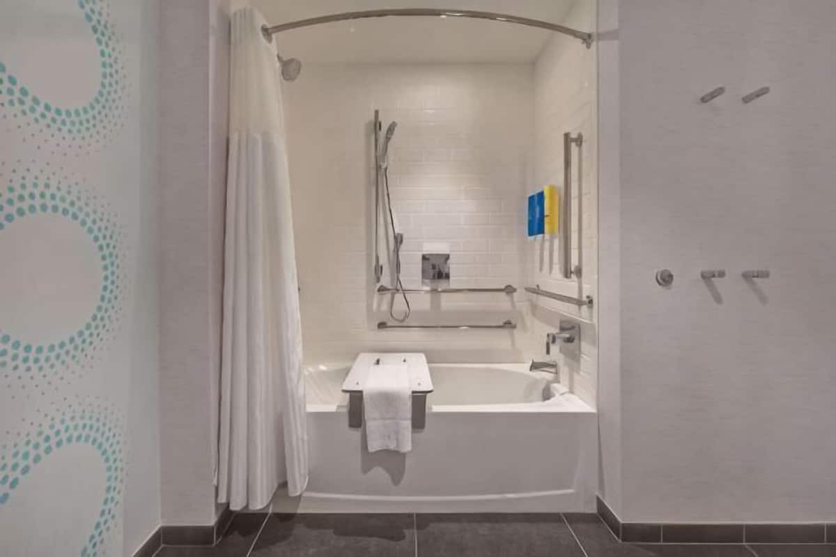 Combined shower/tub, hair dryer, towels, soap