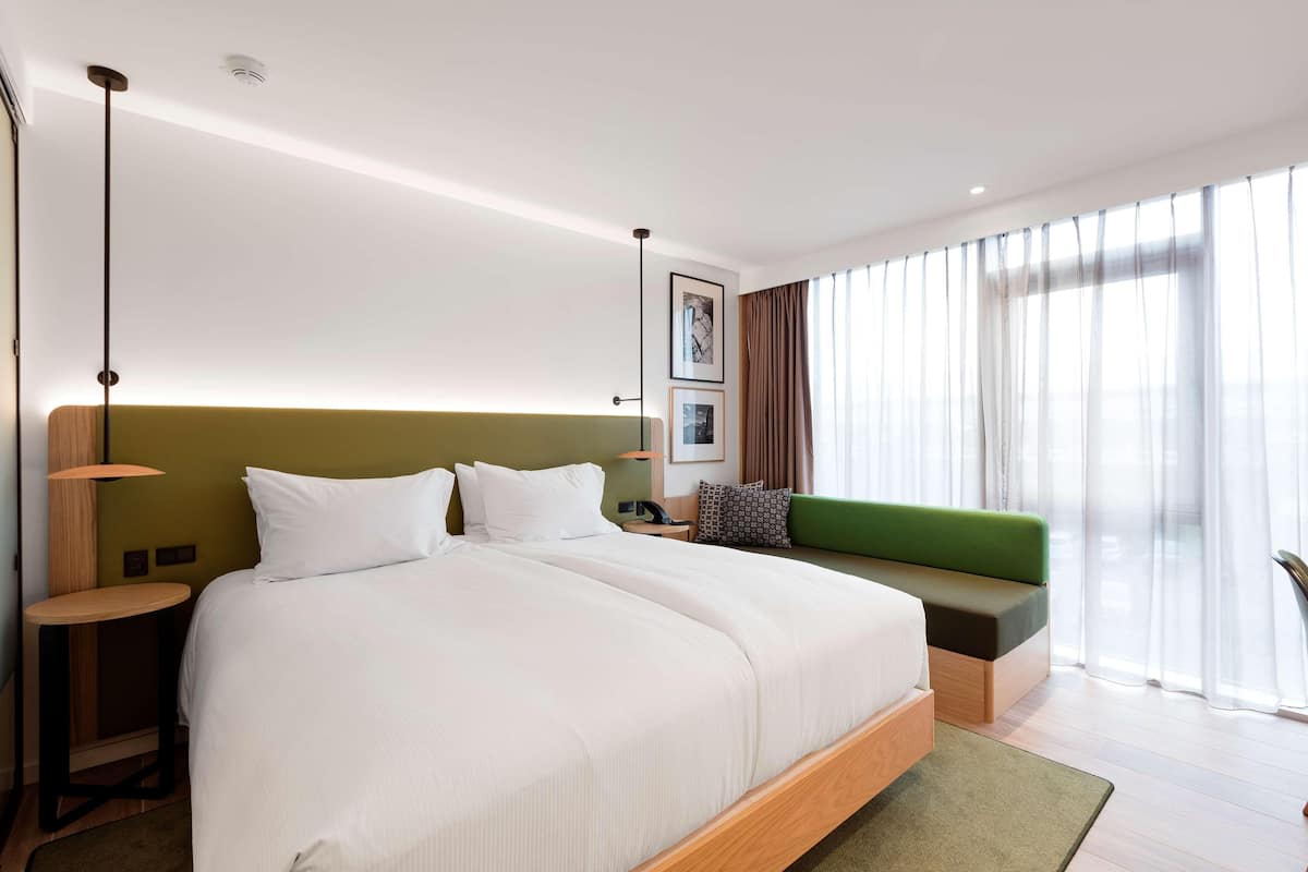Hypo-allergenic bedding available, in-room safe, desk, laptop workspace