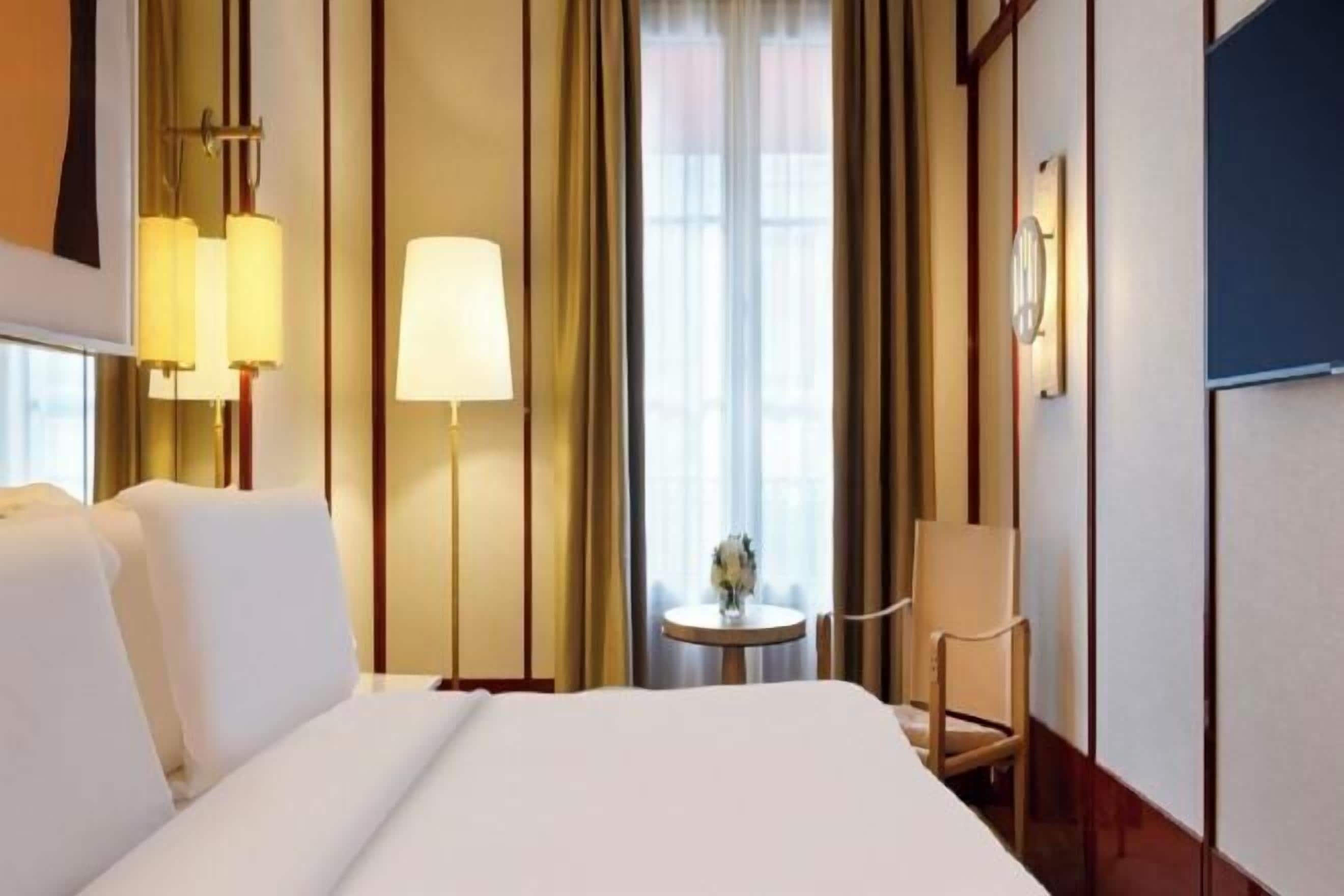 Minibar, blackout drapes, soundproofing, iron/ironing board