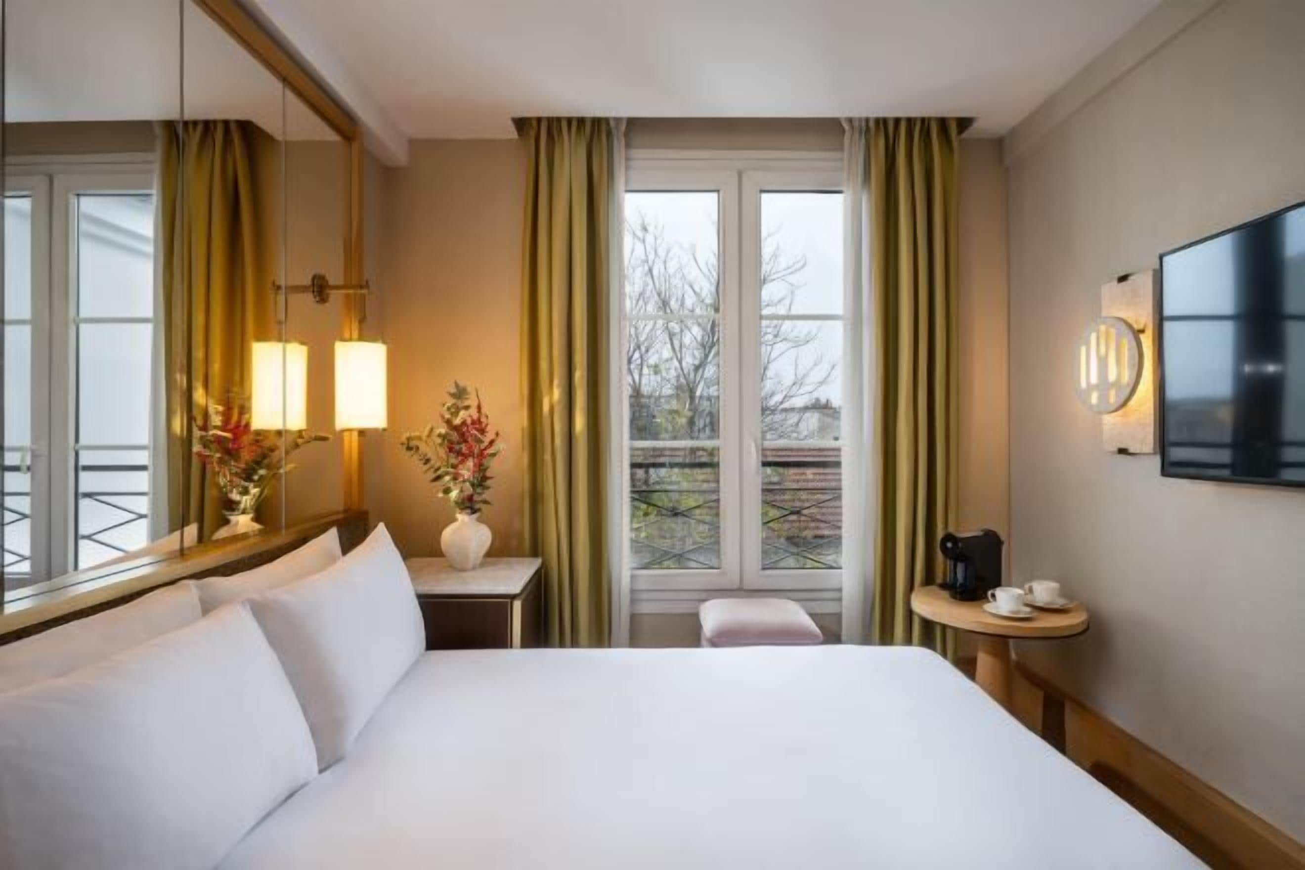 Minibar, blackout curtains, soundproofing, iron/ironing board