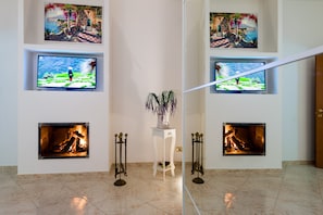 Apartment | Wohnzimmer | Flachbildfernseher, Kamin