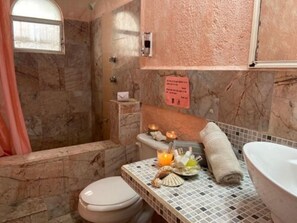 Shower, rainfall showerhead, hair dryer, towels
