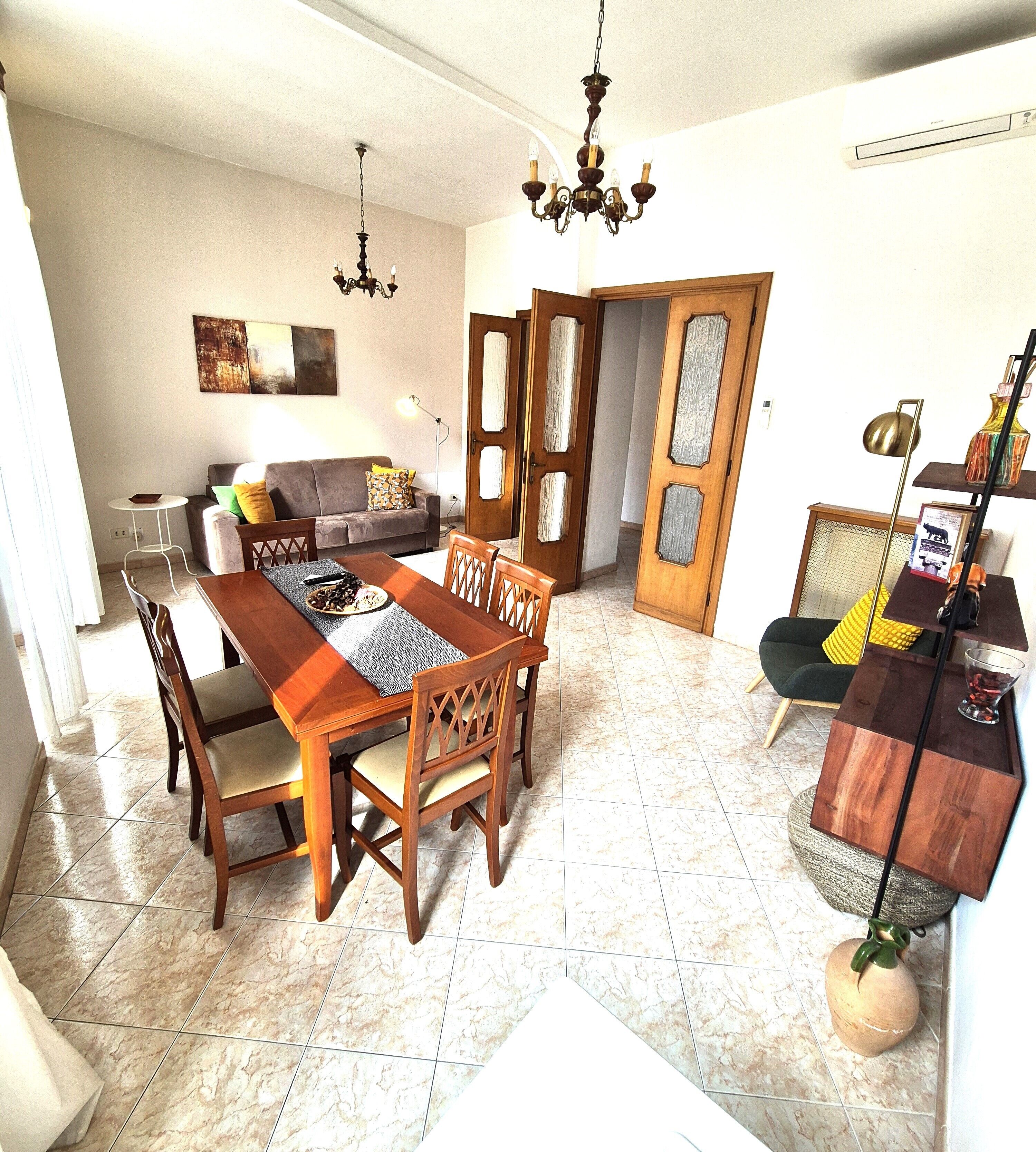 Redseven Rome Apartment | Living area | 33-inch flat-screen TV with cable channels, TV