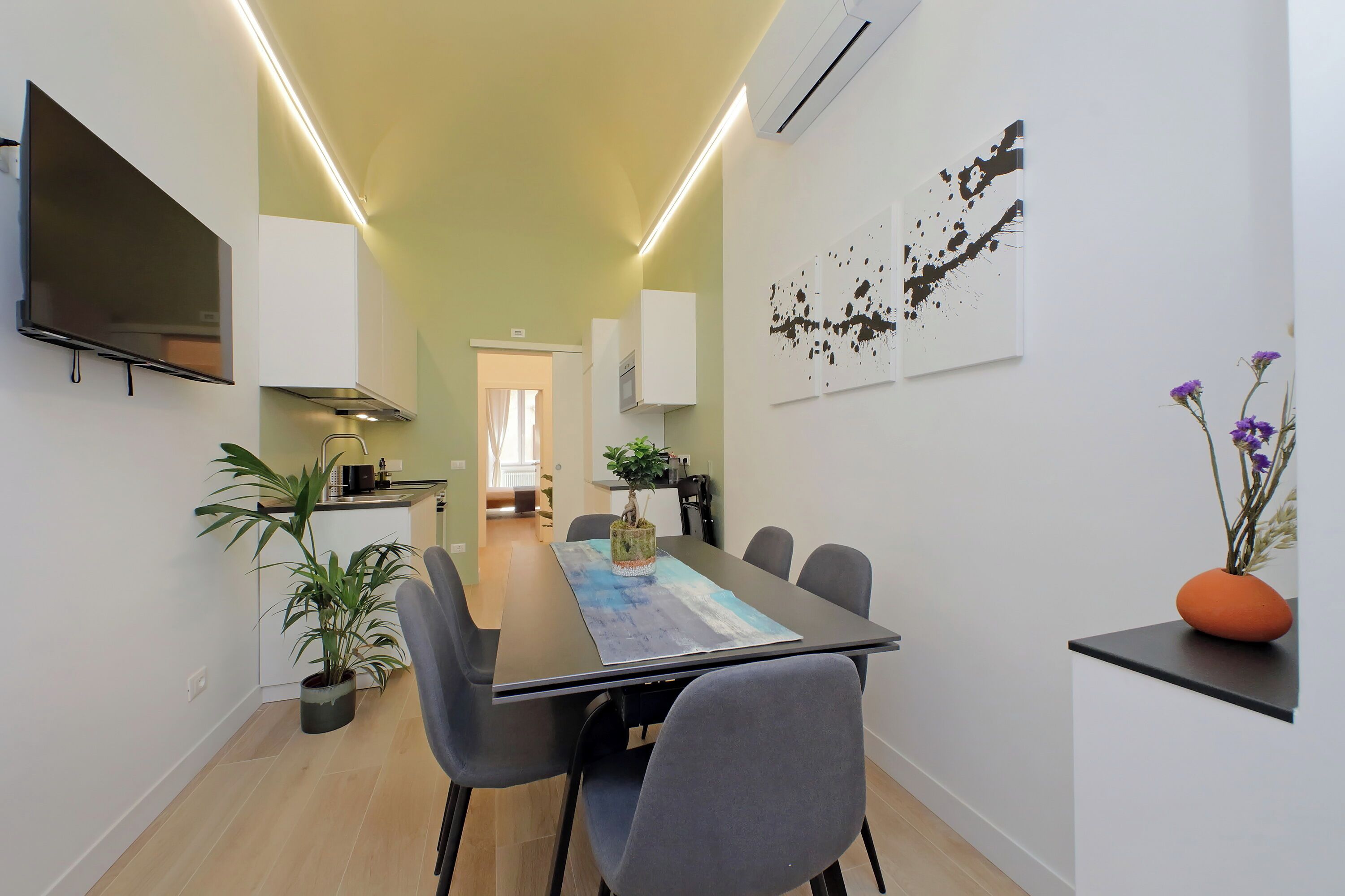 Greenfour Rome Apartment | Private kitchen | Full-size fridge, microwave, oven, stovetop