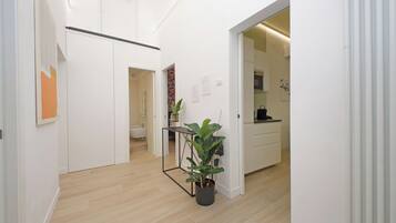 Greenfour Rome Apartment | Living area | 33-inch flat-screen TV with cable channels, TV