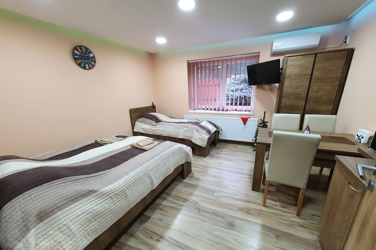 Family Studio | Premium bedding, memory foam beds, in-room safe, soundproofing