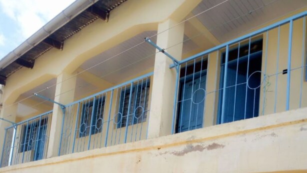 A multi-story building with balconies, windows, and doors. - The Place Bar And Restaurant (Oyugis)