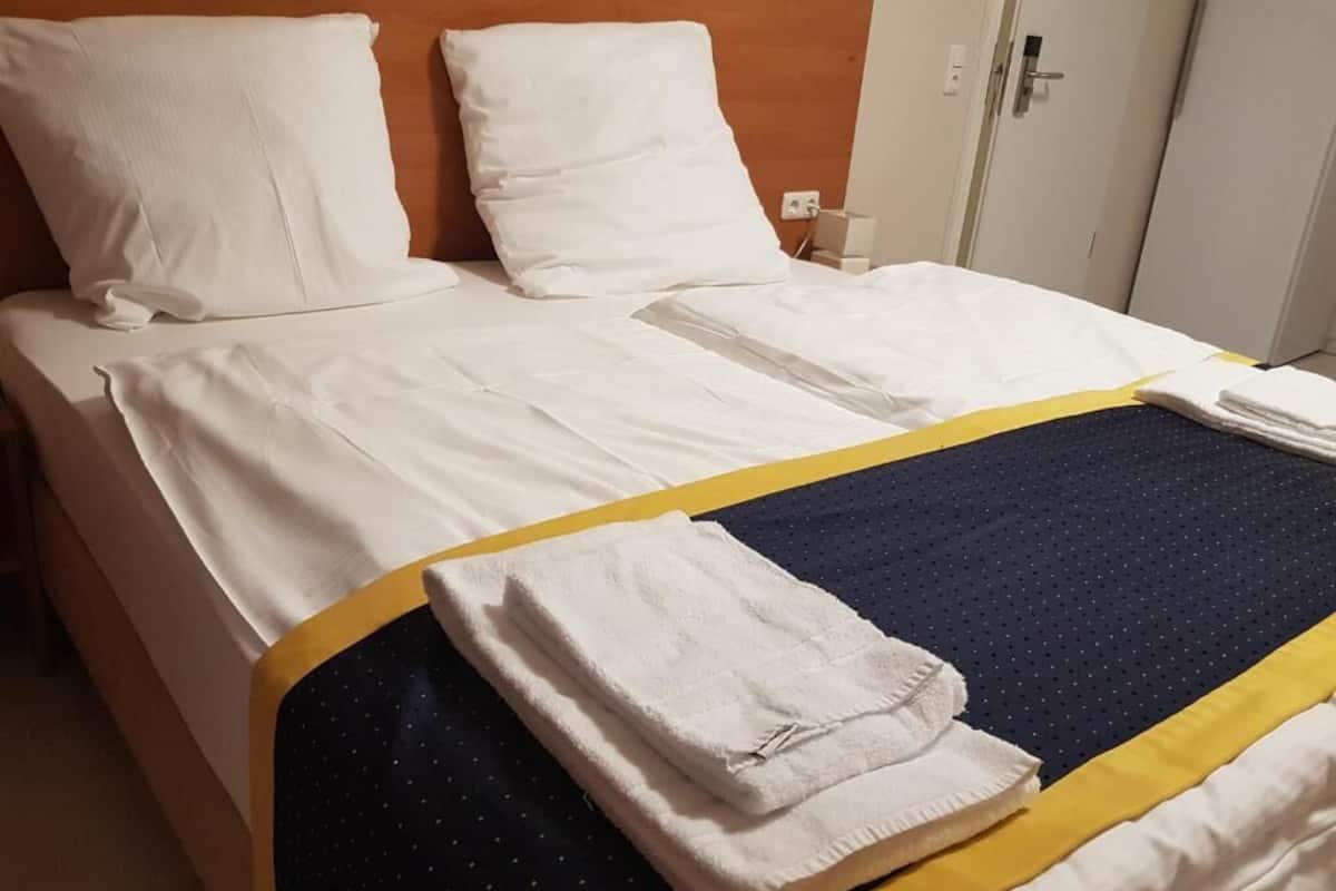 Desk, free WiFi, bed sheets