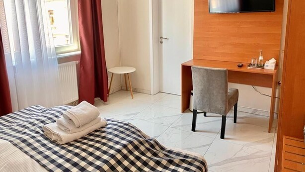 Kamar Single Standar | Meja kerja, Wi-Fi gratis, dan seprai linen