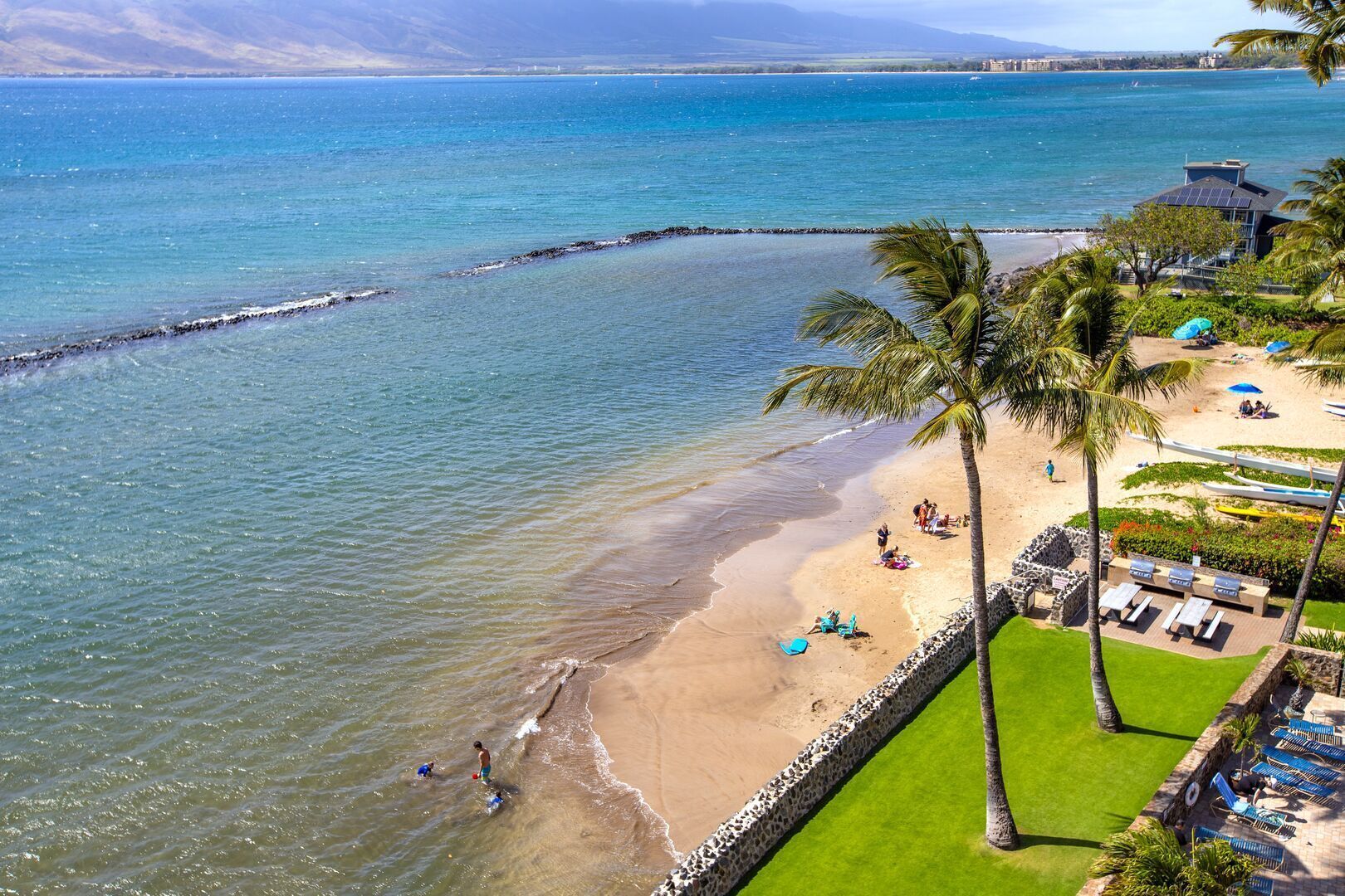 On the beach, sun-loungers, beach towels
