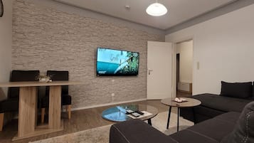 Grand Apartment | Living area | TV