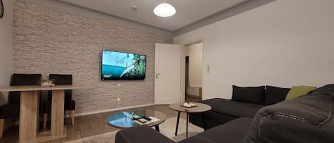 Grand appartement | Woonruimte | Televisie