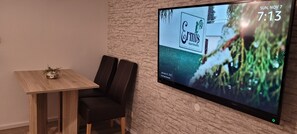 Grand appartement | Woonruimte | Televisie