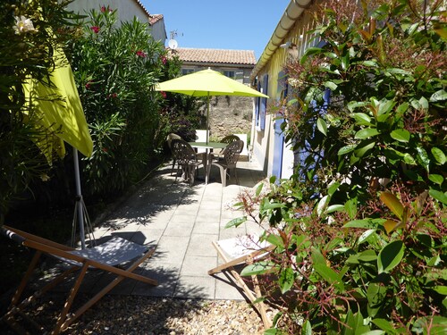 Encantadora casa de pueblo con jardín