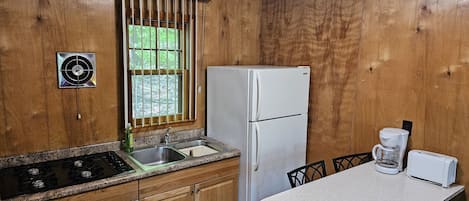Fridge, stovetop, coffee/tea maker, toaster
